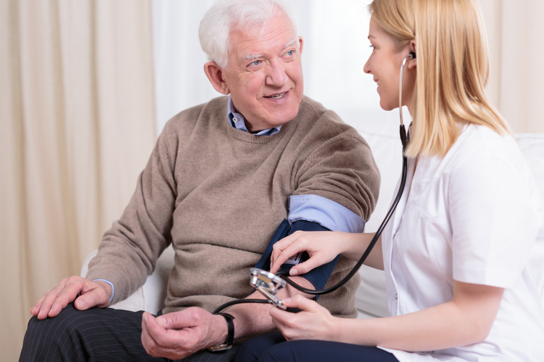gesundheits-krankenpfleger-caregiver-checking-the-hypertension-2024-10-20-02-41-28-utc